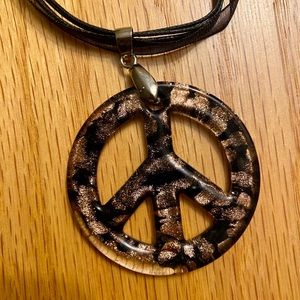 Brand new never worn peace sign necklace